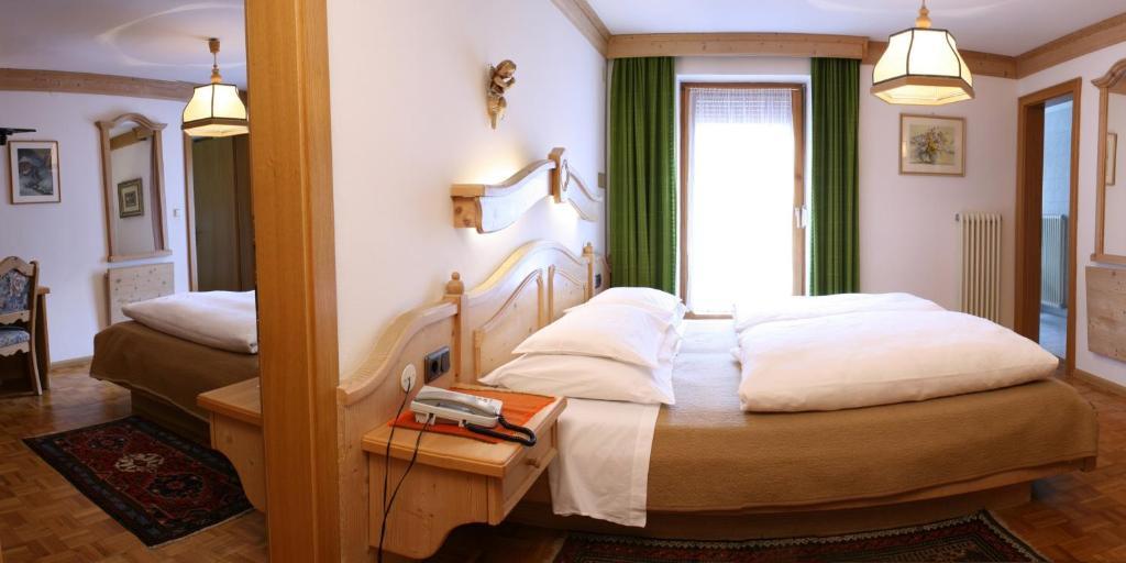 Hotel Dolomiti Madonna Ortisei Rum bild